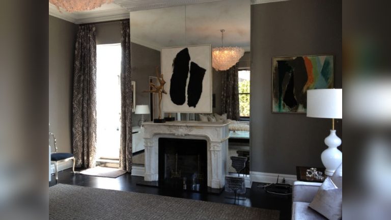 How to Hang a Mirror on a Mirrored Wall
